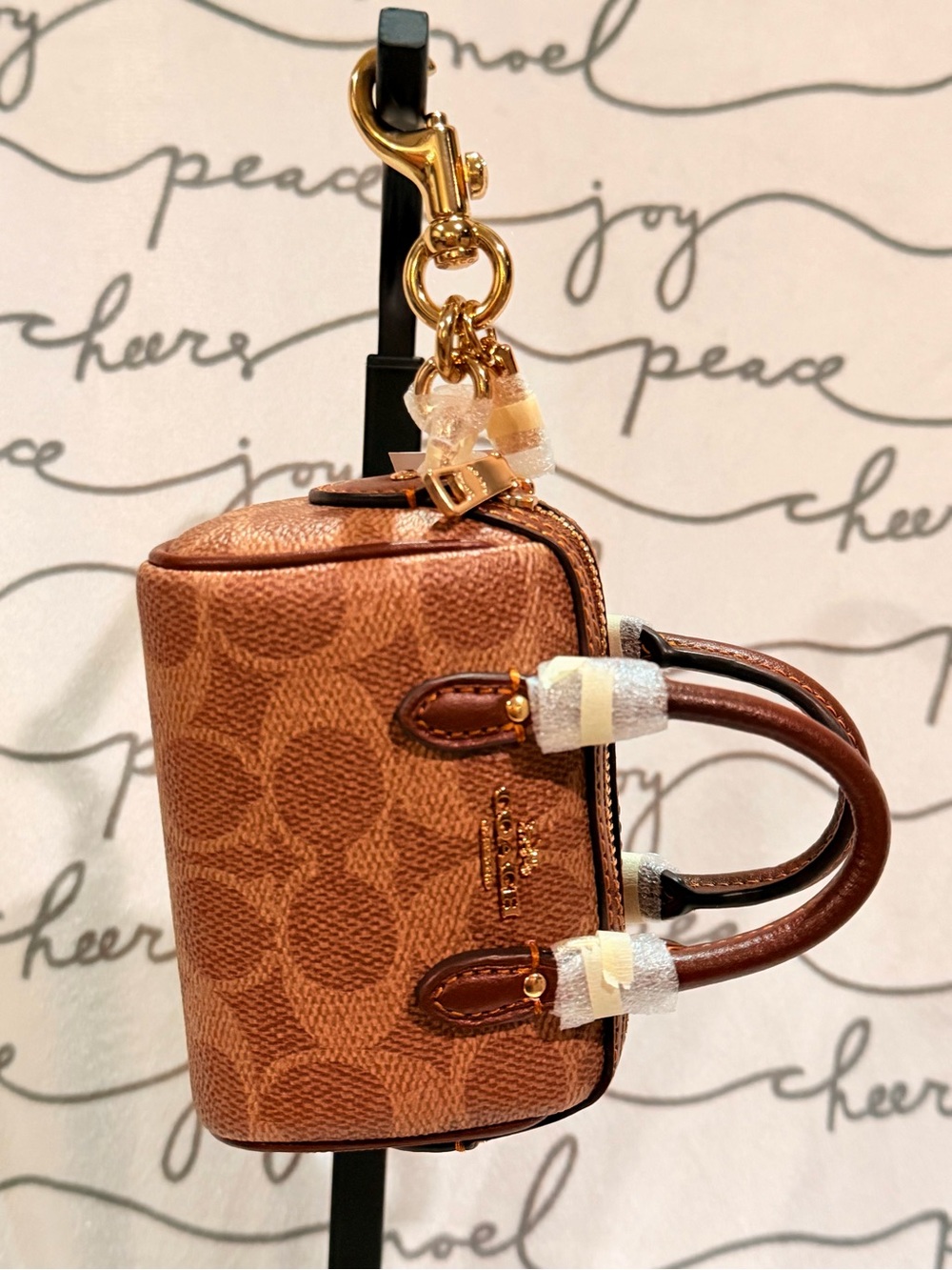 COACH Mini Rowan Bag Charm In Signature Canvas Gold Tan brown
Gold hardware NWT - Picture 2 of 4